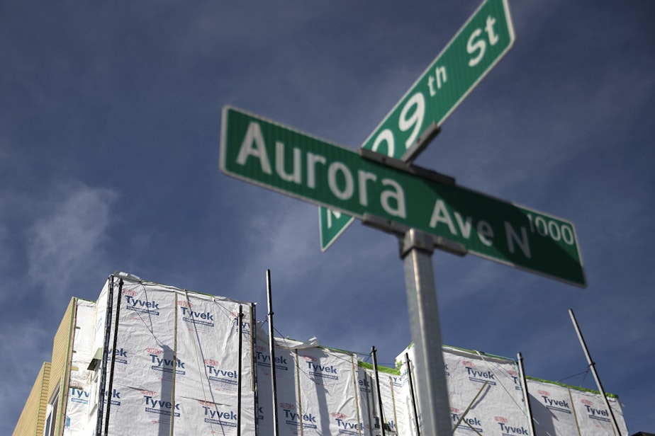 caption: Construction continues on a new apartment complex on Monday, March 12, 2018, at the intersection of Aurora Avenue North and 109th St., in Seattle.