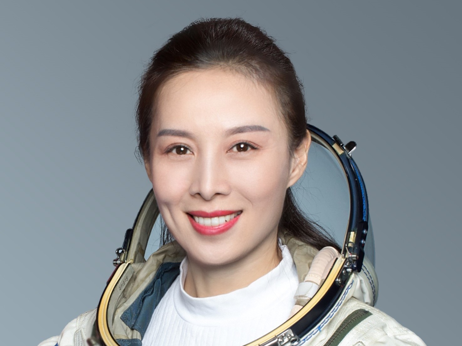 caption: Wang Yaping is one of three astronauts aboard the Shenzhou 13 spaceflight mission. She will be the first female astronaut to visit the latest Chinese space station, but she has the most space experience of the three.