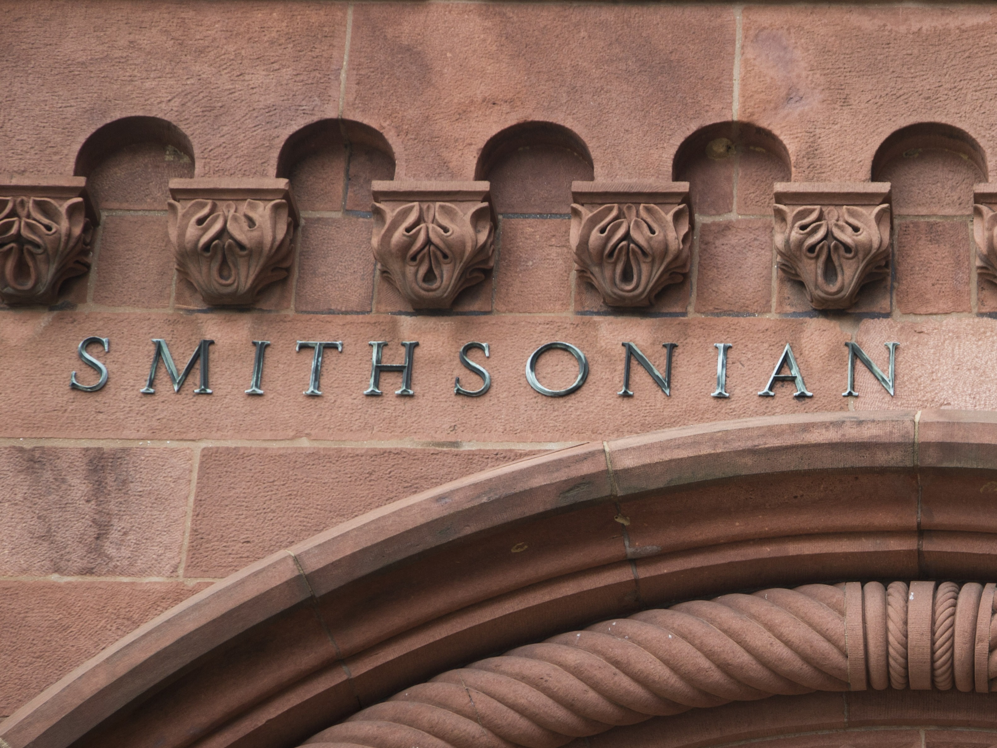 caption: The entry to the Smithsonian Institution's Smithsonian Castle in Washington, D.C.