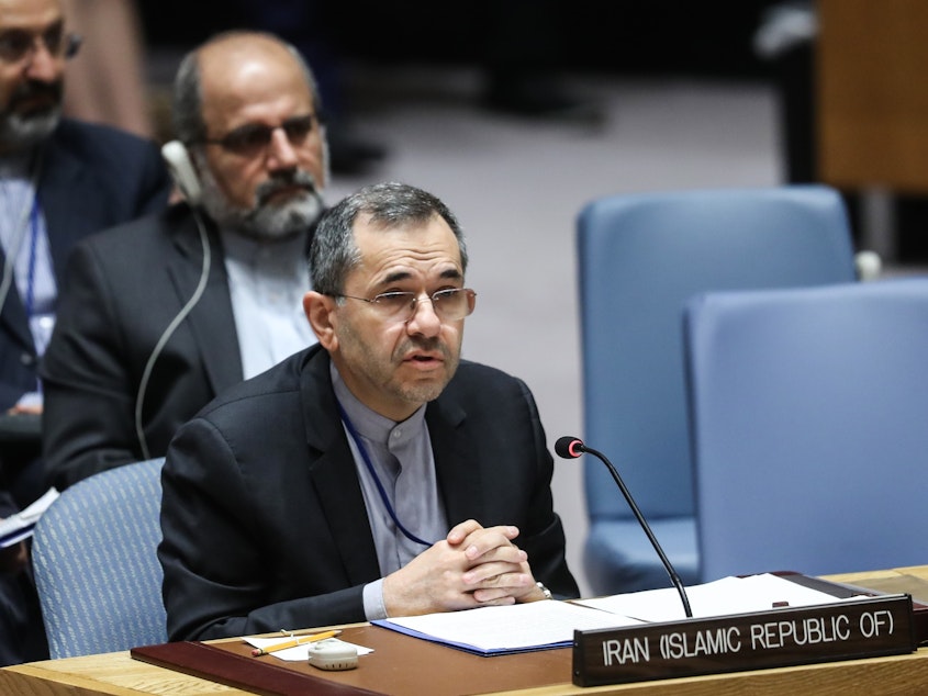 caption: Iran's Ambassador to the United Nations Majid Takht Ravanchi delivers a speech in June during a U.N. Security Council meeting.
