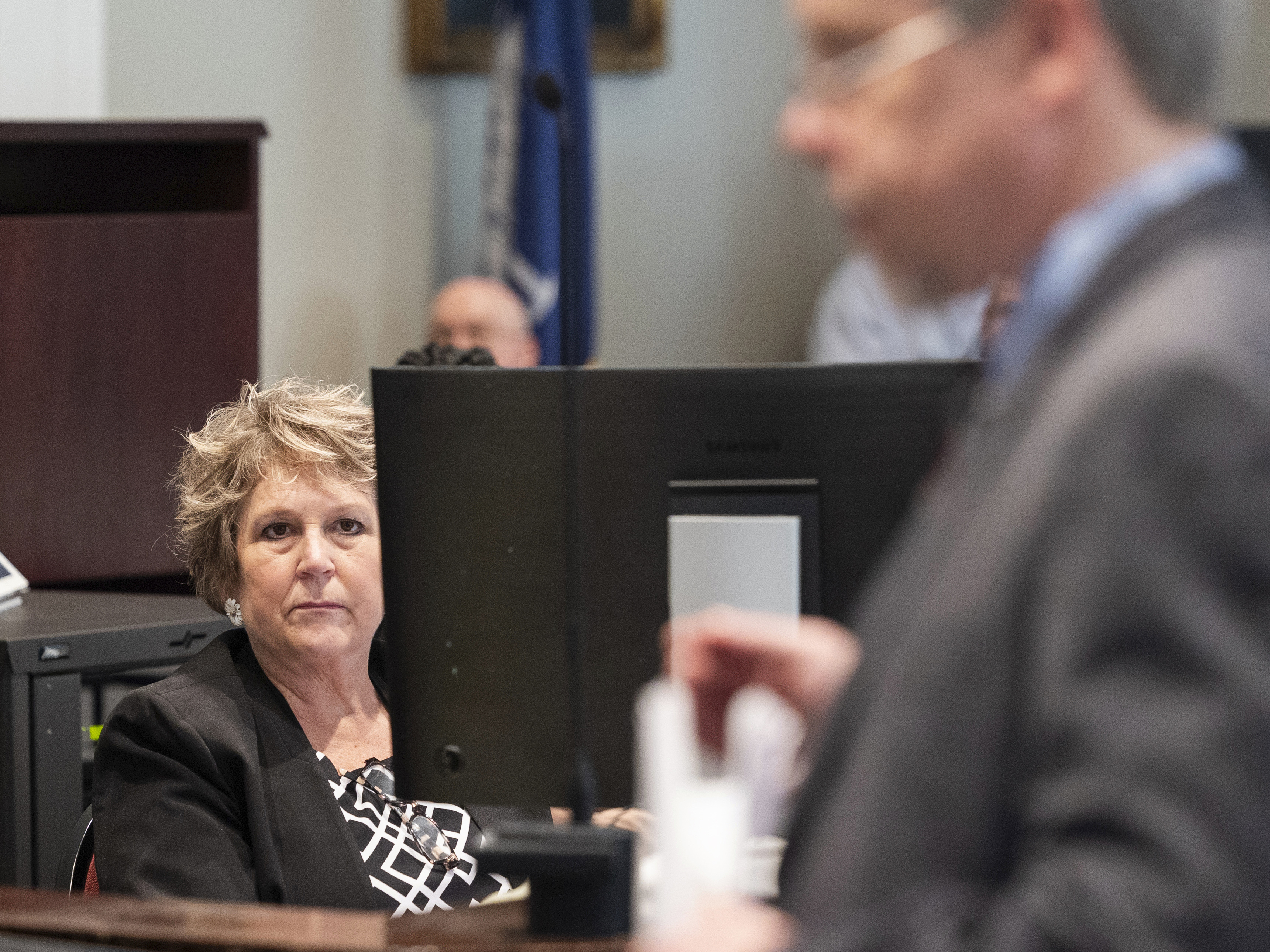 caption: Colleton County Clerk of Court Rebecca Hill, seen here as prosecutor Creighton Waters makes closing arguments in the Alex Murdaugh trial, is accused of improperly influencing jurors in the high-profile murder case.