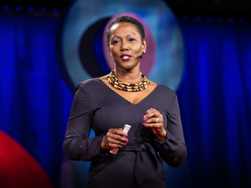 caption: Monique Morris on the TED stage.