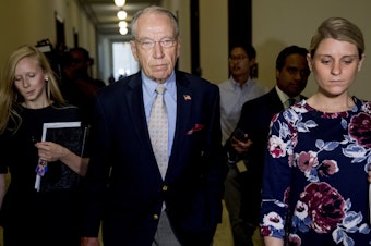 caption: Senate Judiciary Committee Chairman Chuck Grassley, R-Iowa, departs after speaking to reporters on Capitol Hill on Sept. 19.