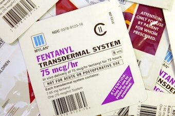 caption: A collection of fentanyl patches, clearly marked with warnings against non-prescribed uses, shown in 2006.