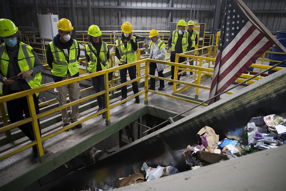 caption: KUOW listeners take a tour of the recycling center on Friday, October 26, 2018, at Cascade Recycling Center in Woodinville. 