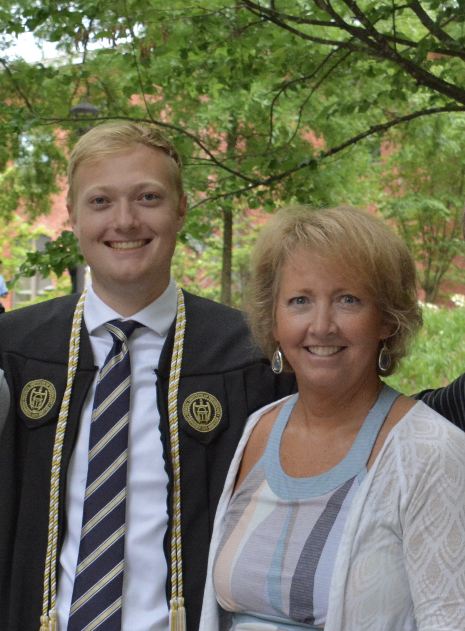 caption: Jean and Jack Bryant at his graduation.