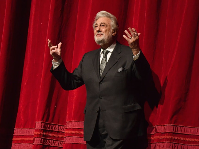 caption: Plácido Domingo, onstage at New York's Metropolitan Opera last year. Nine women have accused Domingo of trying to pressure them into a sexual relationship by offering them jobs.