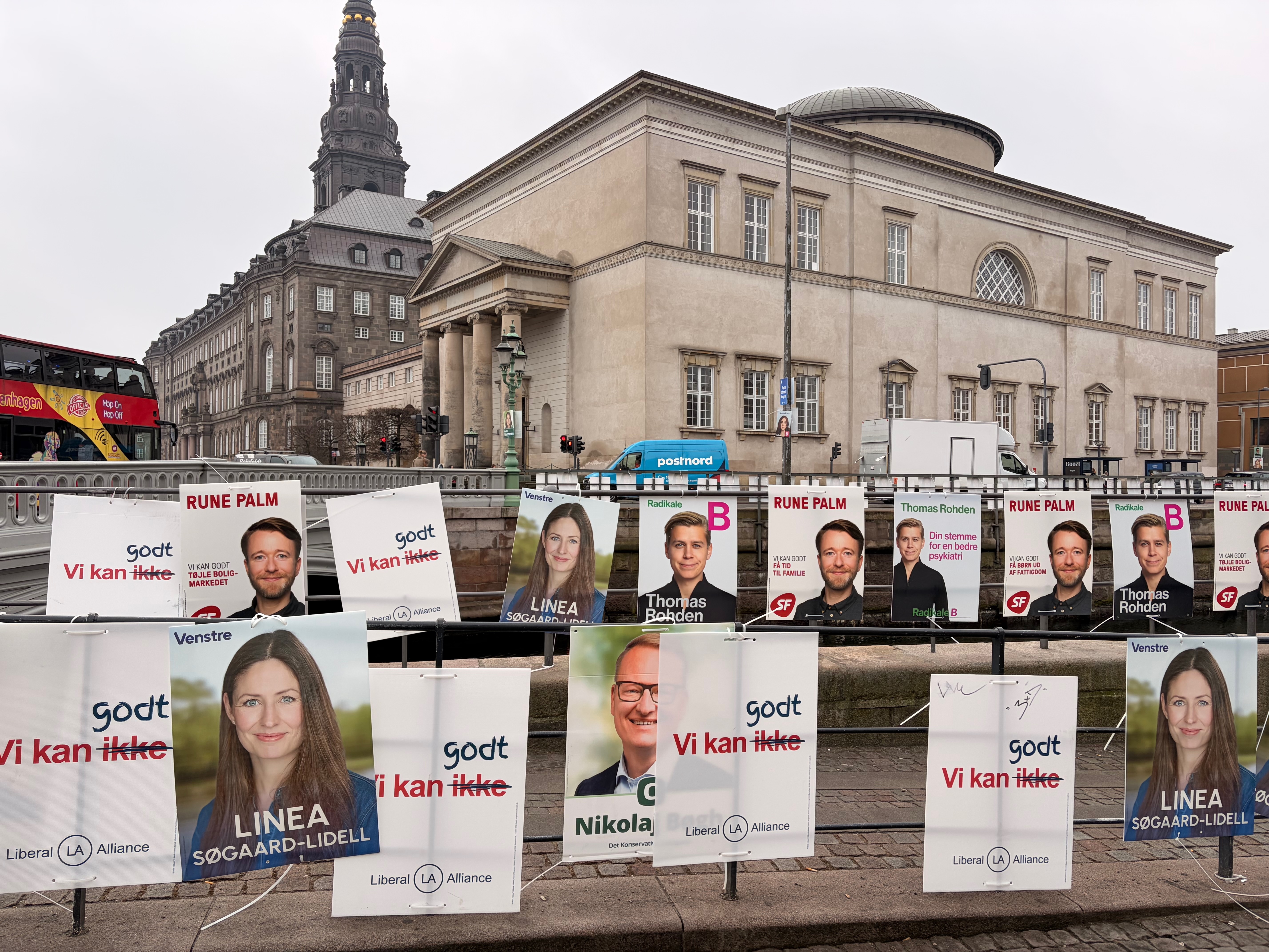 caption: Parliamentary election campaign posters line the streets leading up to the Parliament building in Copenhagen, Denmark.