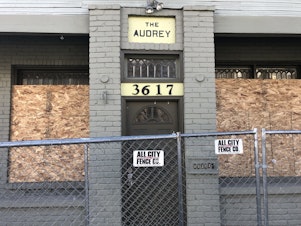 caption: The Audrey apartment building in Seattle's Fremont neighborhood a few weeks after an apartment there caught fire. 