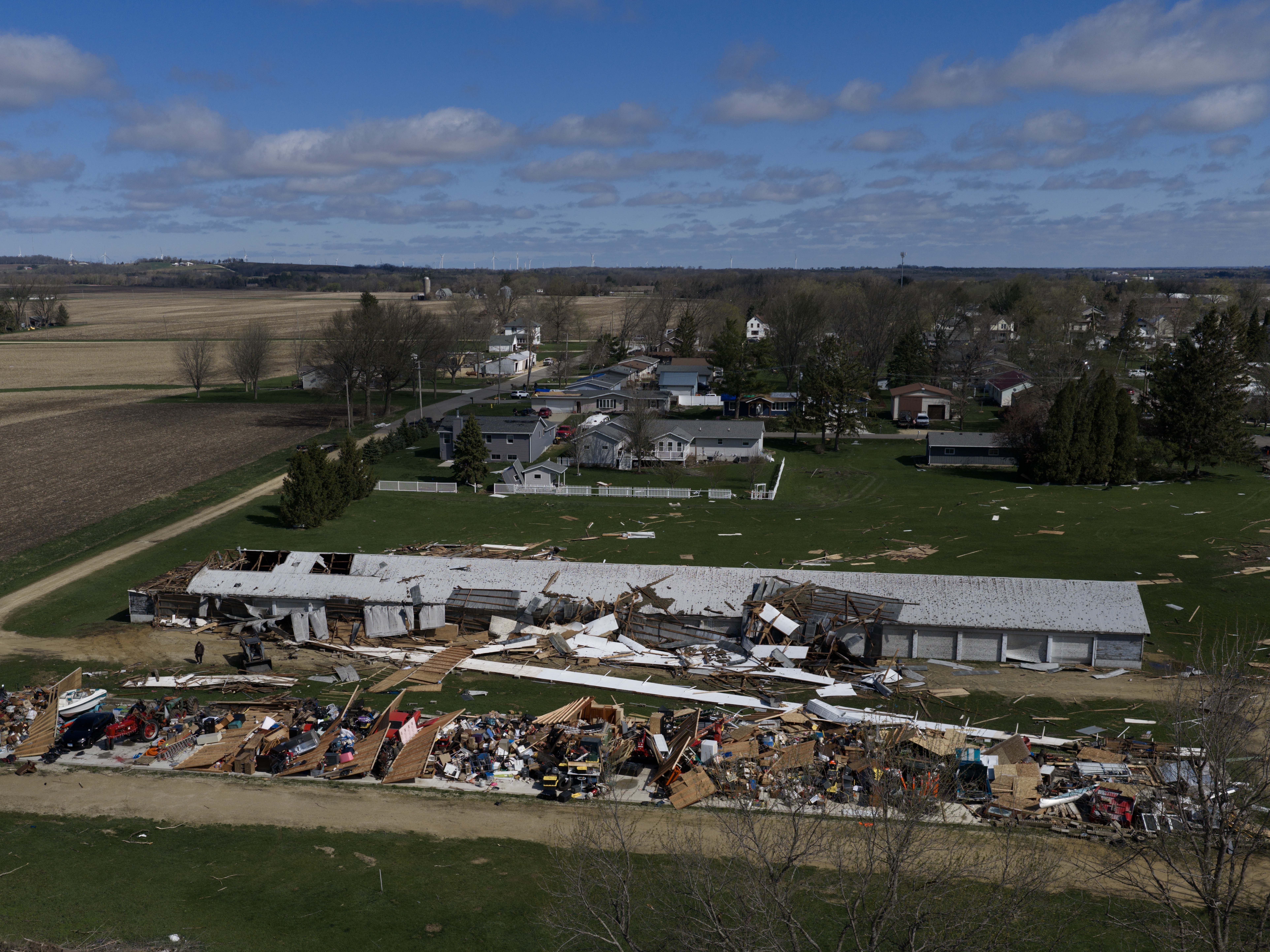caption: An aerial view shows damage from a tornado, on Saturday in Lena, Ill.