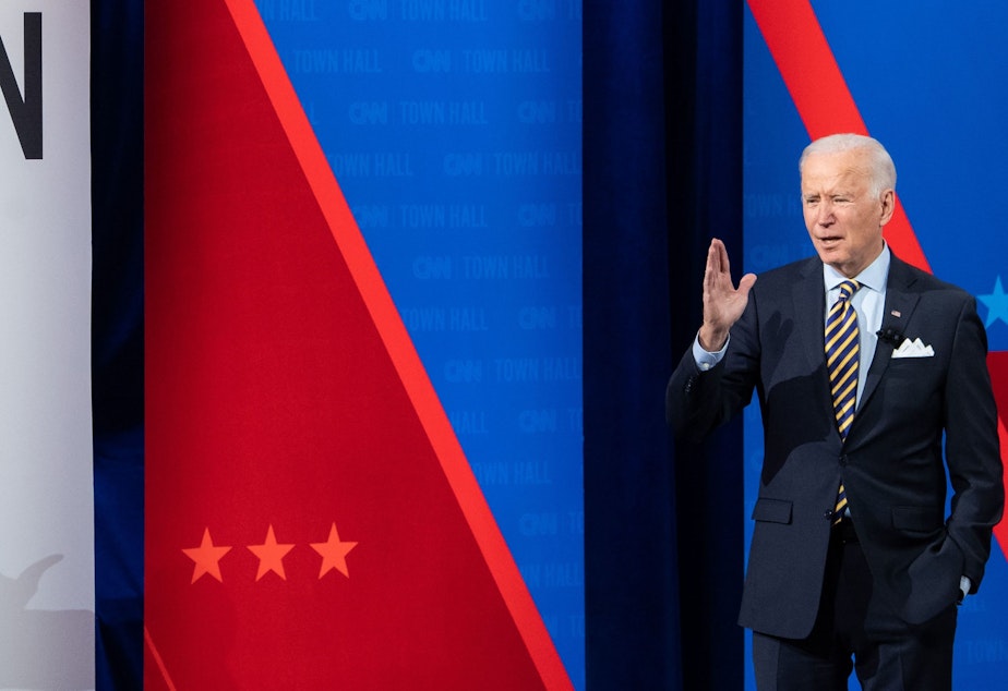 caption: President Joe Biden participates in a CNN town hall at the Pabst Theater in Milwaukee, Wis., Tuesday evening.