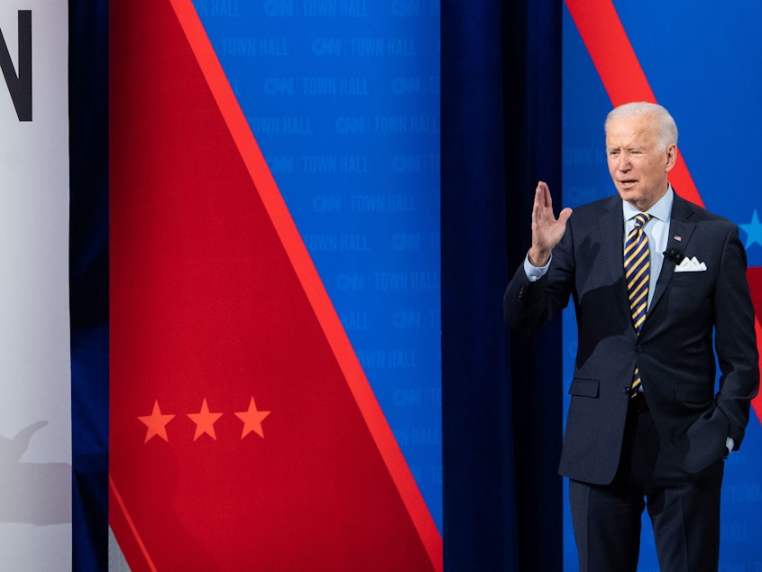 caption: President Joe Biden participates in a CNN town hall at the Pabst Theater in Milwaukee, Wis., Tuesday evening.