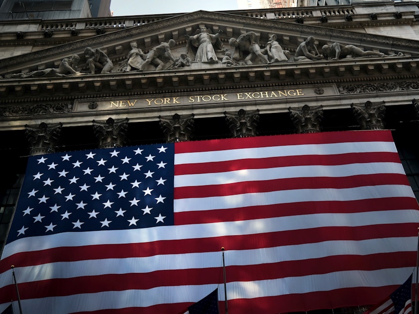 caption: The American flag hangs in front of the New York Stock Exchange on September 21, 2020, in New York City. Citigroup estimates the U.S. economy lost $16 trillion over the past 20 years as a result of discrimination against African Americans.