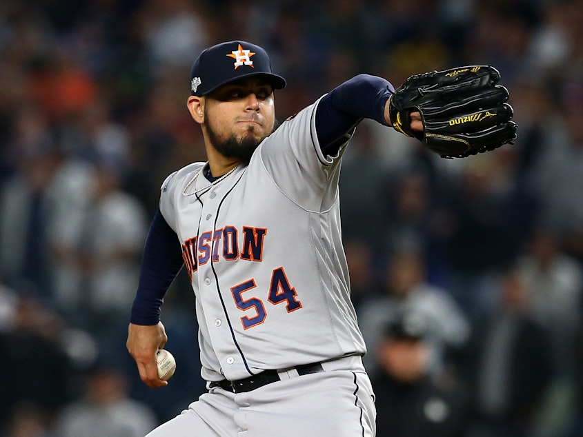 caption: The Houston Astros' Roberto Osuna pitches against the New York Yankees in game three of the American League Championship Series at Yankee Stadium on Oct. 15.