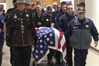caption: Pierce County Sheriff's Department posted this photo to their Facebook page, announcing the death of Deputy Daniel A. McCartney.