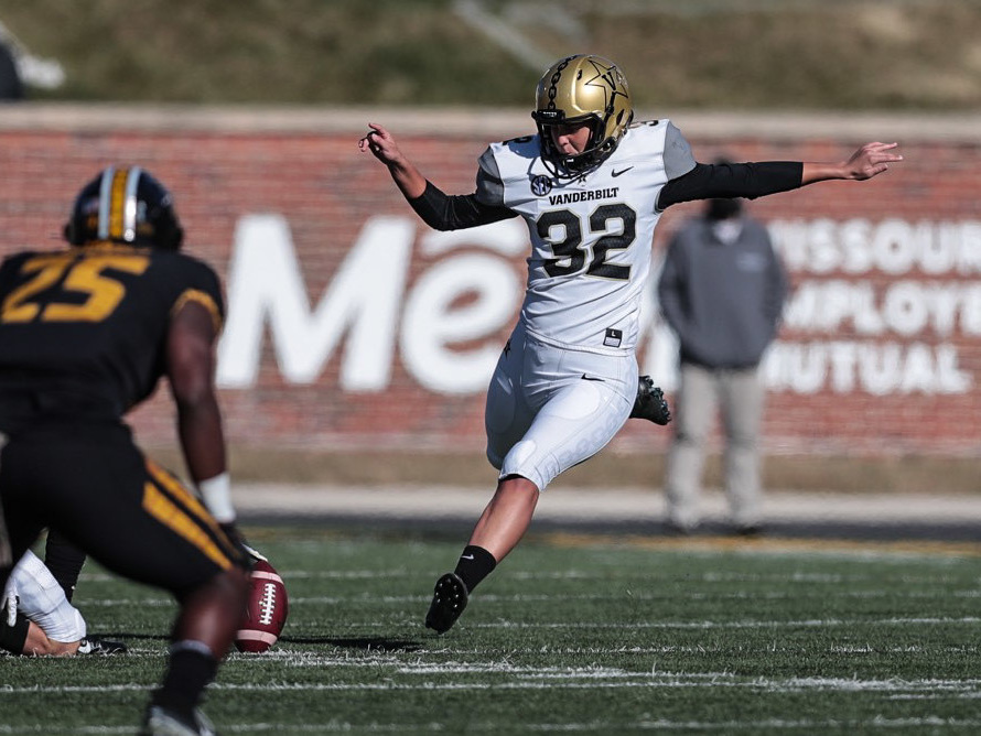 caption: Sarah Fuller of the Vanderbilt Commodores kicks off Saturday in the second half against the University of Missouri Tigers at Memorial Stadium in Columbia, Mo.