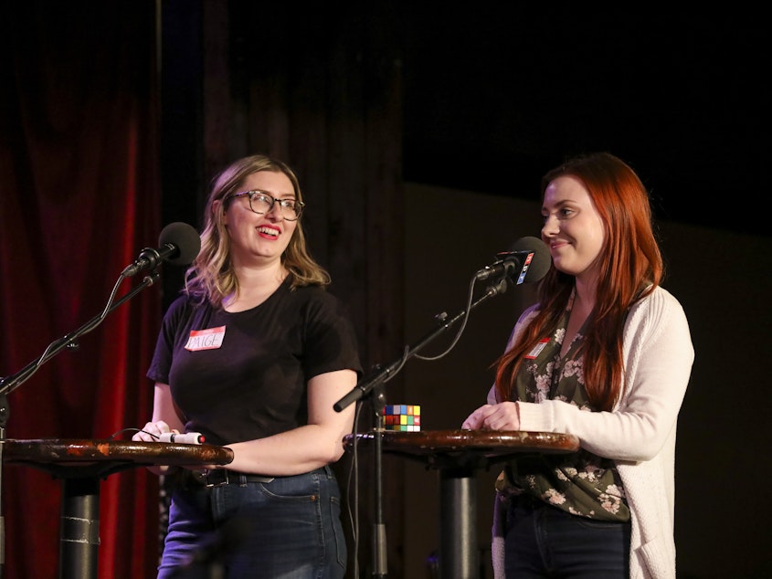 caption: Contestants compete in the final round on <em>Ask Me Another</em> at the Bell House in Brooklyn, New York.