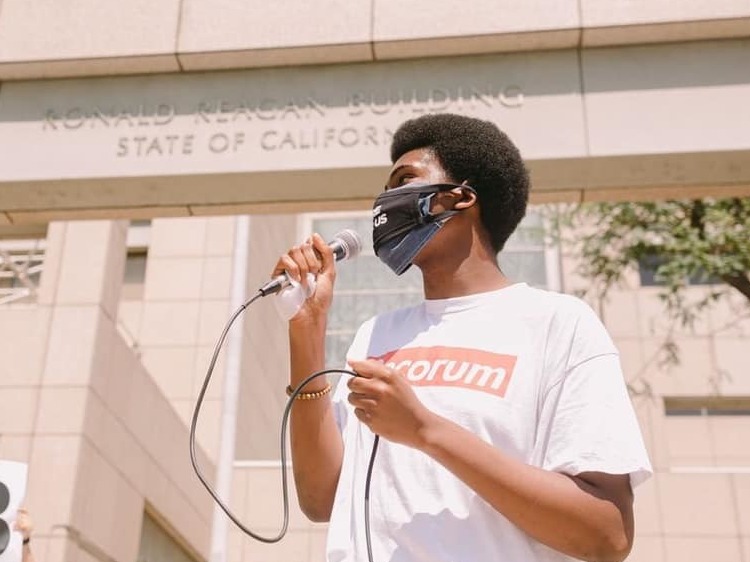 caption: In an effort to boost civic engagement among younger voters, Tyler Okeke, 19, has been campaigning to lower the voting age to 16.