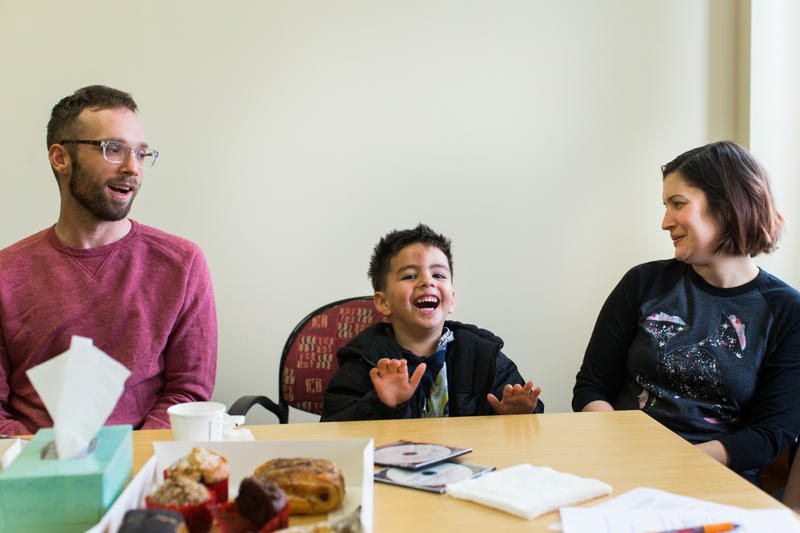 caption: Seattle Symphony musicians Eric Jacobs and Danielle Kuhlmann have some fun with Giovanny, the four-year-old son of Taylor Joffre, before a sharing session for the Lullaby Project at Mary’s Place in Seattle, Monday, May 7, 2018.
