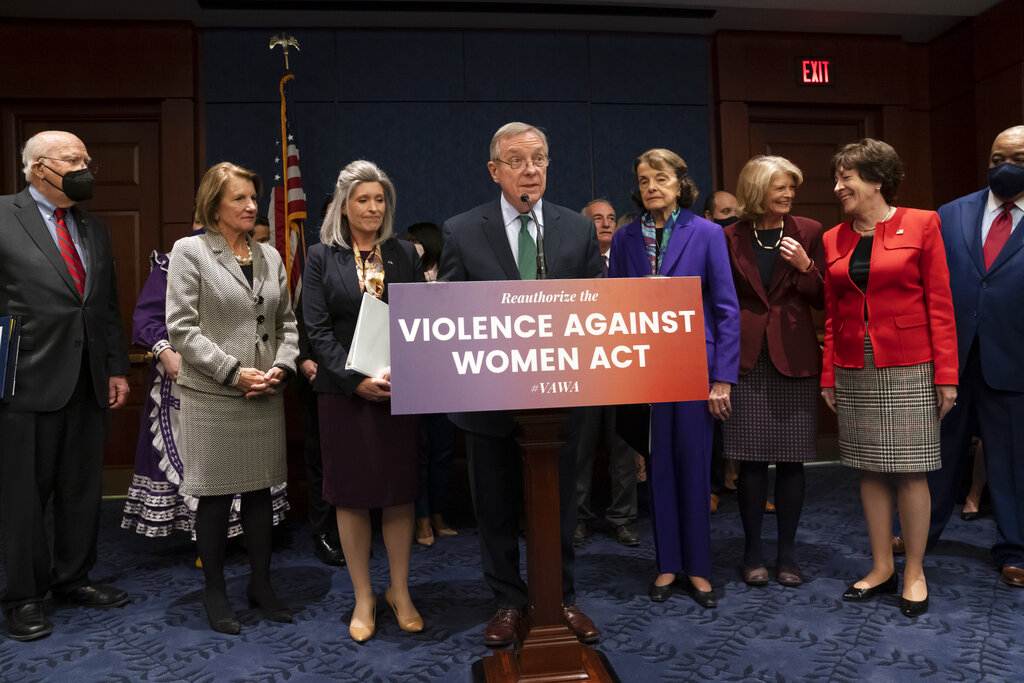 caption: Senate Judiciary Chairman Dick Durbin, D-Ill., center, holds a news conference to announce a bipartisan update to the Violence Against Women Act, at the Capitol in Washington, Wednesday, Feb. 9, 2022. He is joined by, from left, Sen. Patrick Leahy, D-Vt., Sen. Shelley Moore Capito, R-W.Va., Sen. Joni Ernst, R-Iowa, Sen. Dianne Feinstein, D-Calif., Sen. Lisa Murkowski, R-Alaska, and Sen. Susan Collins, R-Maine. (AP Photo/J. Scott Applewhite)