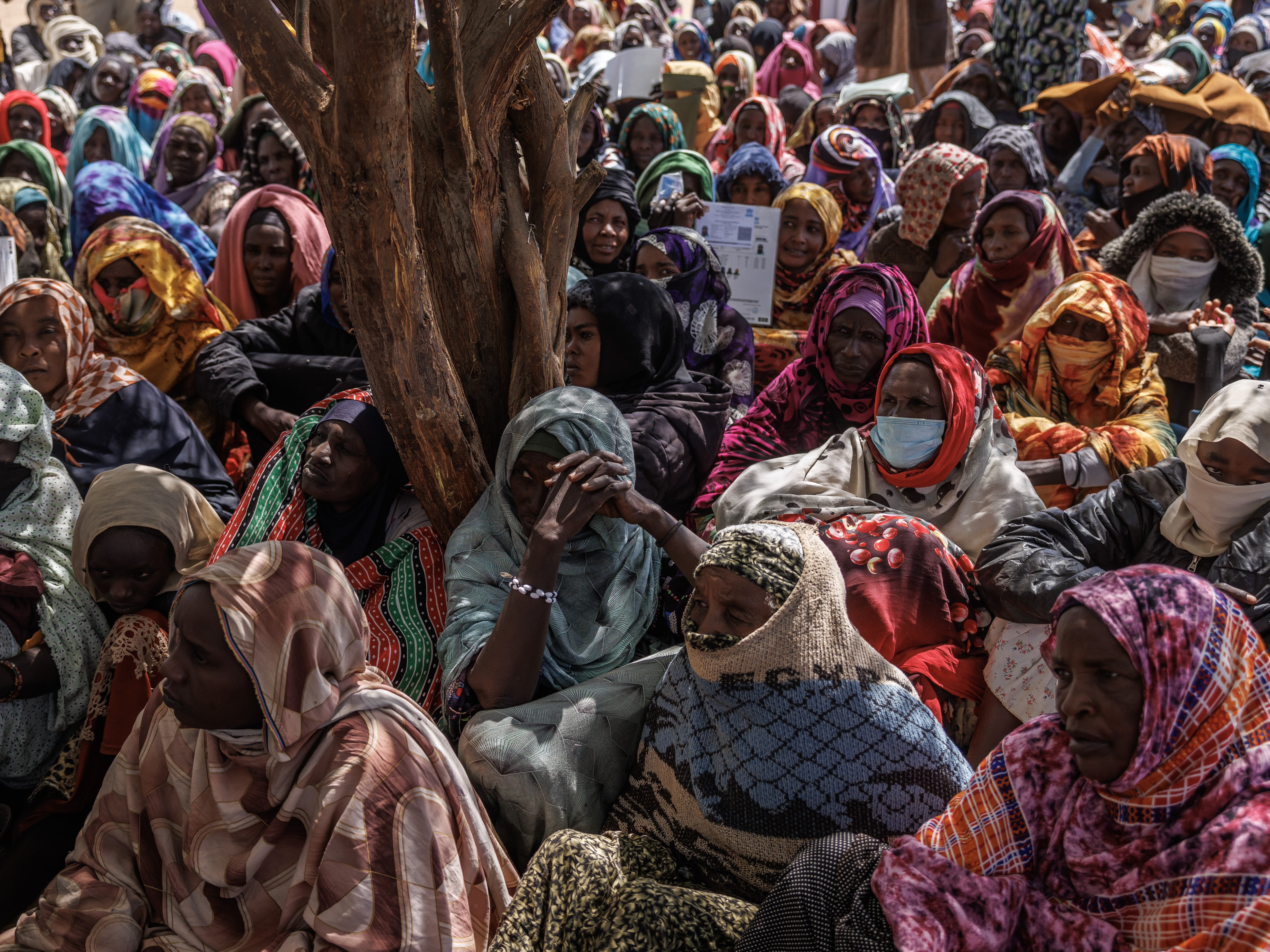 caption: Sudanese refugees wait for registration at Oure Cassoni camp in Chad after fleeing the conflict on Feb. 23, 2026. The war has displaced about 14 million people, fueling a major humanitarian crisis.