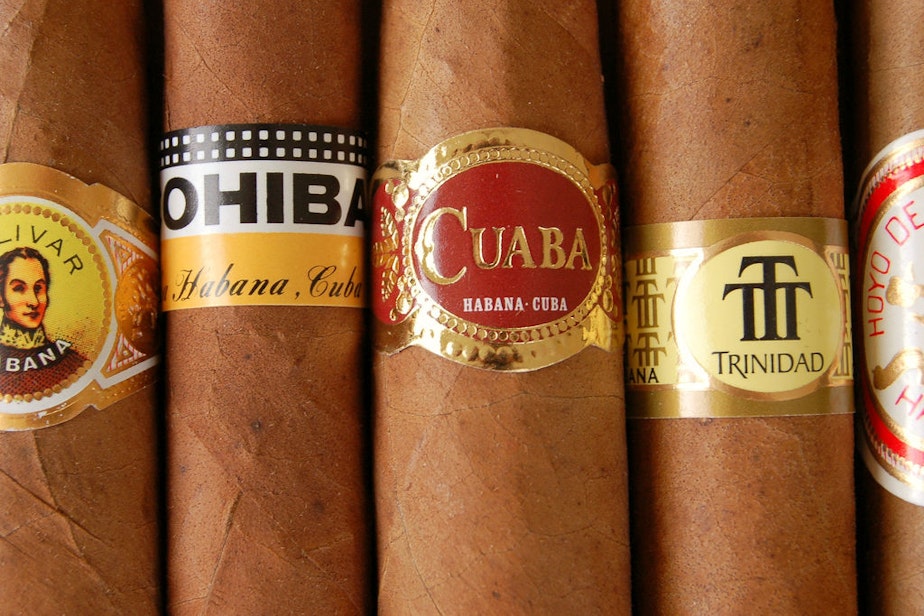 caption: A selection of Cuban cigars.