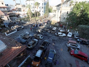 caption: A view shows an area of Al Ahli Arab Hospital where hundreds of Palestinians were killed in a blast. The blast area was relatively small but occurred in an area packed with Palestinian civilians.