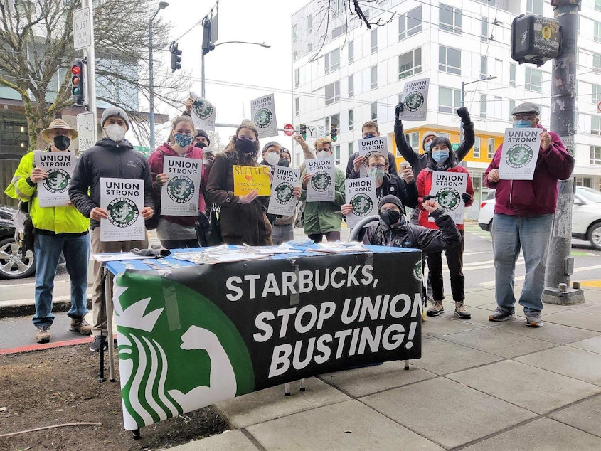 caption: Starbucks workers and supporters at the Broadway and Denny store on Seattle's Capitol Hill, Feb. 19, 2022.