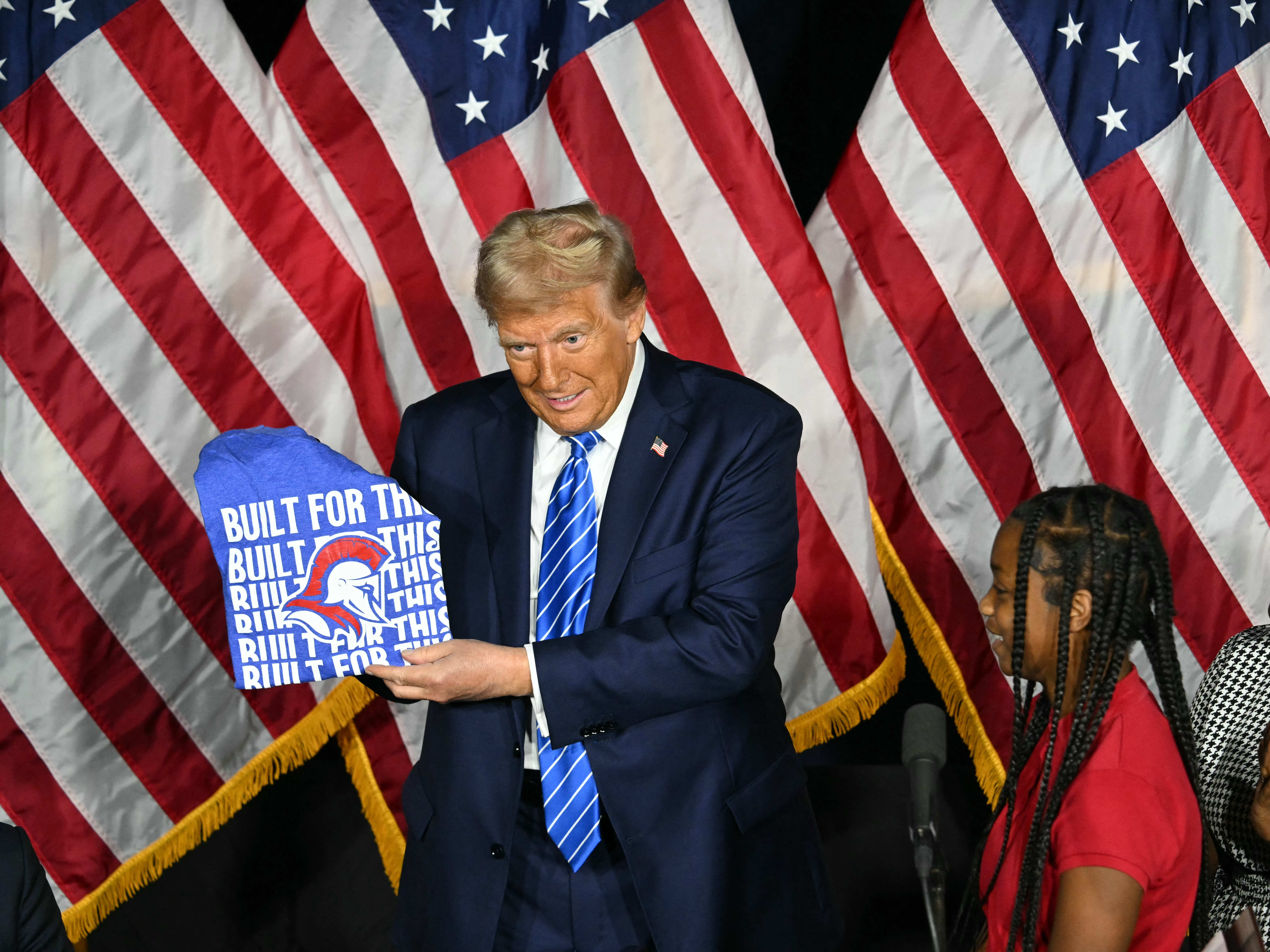 caption: President Trump at a campaign event in Milwaukee on Oct. 1.