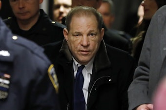 caption: Harvey Weinstein leaves court in New York City on Tuesday with the assistance of a walker. The former Hollywood megaproducer, whose career unraveled beneath scores of allegations, is facing multiple criminal charges of rape and predatory sexual assault.