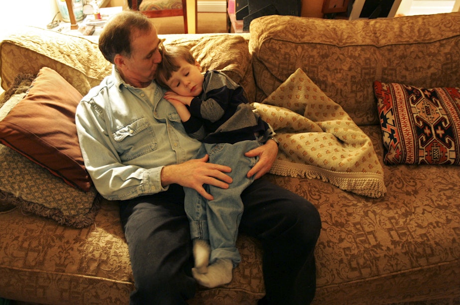 caption: Thomas Soukakos, left, rests with his son Alexander, 3, at their Seattle home on Wednesday, Feb 2, 2005. Soukakos' wife suffered from postpartum depression and committed suicide months after Alexander's birth. Postpartum depression is much more serious and long-lasting. It strikes at least one in 10 and perhaps as many as one in eight new mothers. 