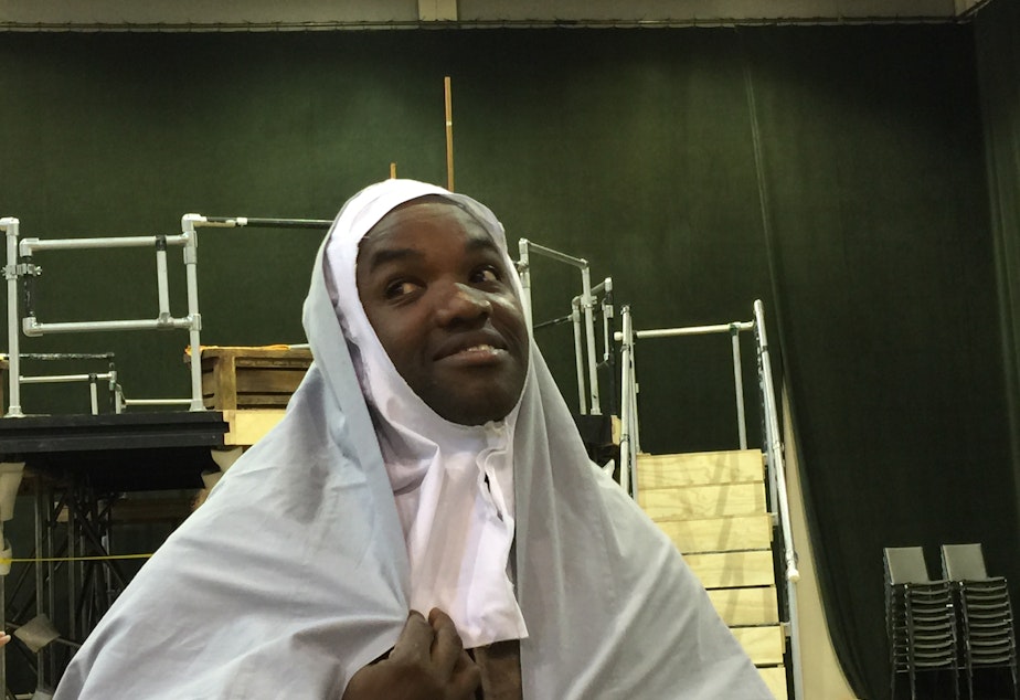 caption: Tenor Lawrence Brownlee clowns around during a Seattle Opera rehearsal for Rossini's 'The Wicked Adventures of Count Ory.'