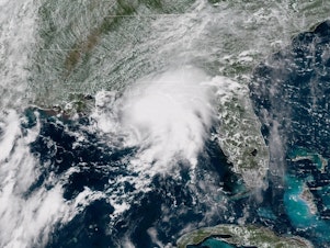 caption: Gordon is predicted to become a hurricane before it makes landfall Tuesday night, bringing a dangerous storm surge. Gordon is seen here in a satellite image from around 1 p.m. CT Tuesday.