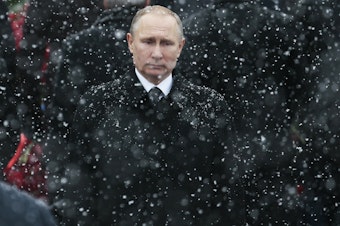 caption: Russian President Vladimir Putin, here at the Tomb of the Unknown Soldier in Moscow in 2017, has seen U.S. relations reach their lowest point since the Cold War. By waiting over a month to congratulate President-elect Joe Biden, Putin tried to show strength and that "he's ready to take the fight all the way to Washington," Russian political commentator Konstantin Eggert says.