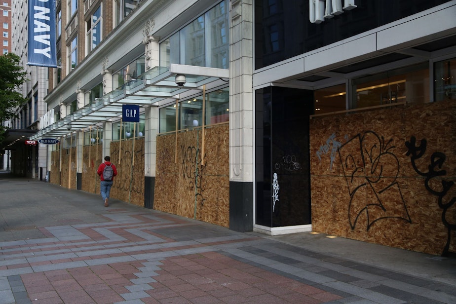 caption: Boarded windows downtown Seattle May 3rd