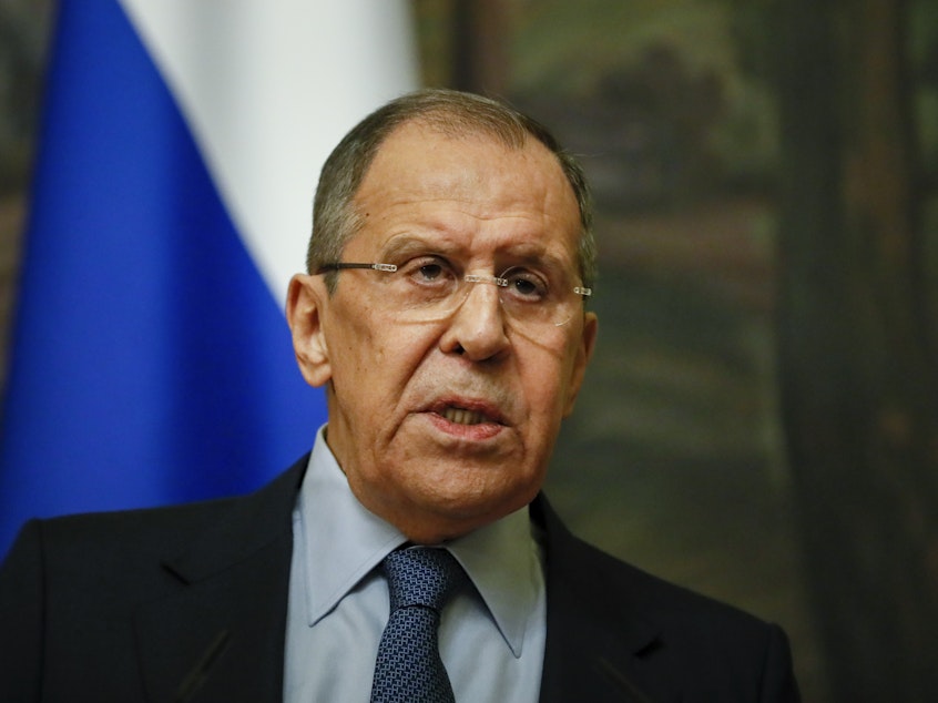 caption: Russian Foreign Minister Sergey Lavrov addresses the media Friday in Moscow. Lavrov announced that Russia will expel 10 U.S. diplomats. The move comes after the Biden administration ordered 10 Russian diplomats to leave the U.S. a day earlier.
