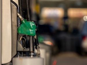 caption: A gas pump is seen at a Shell gas station in Houston on April 1.