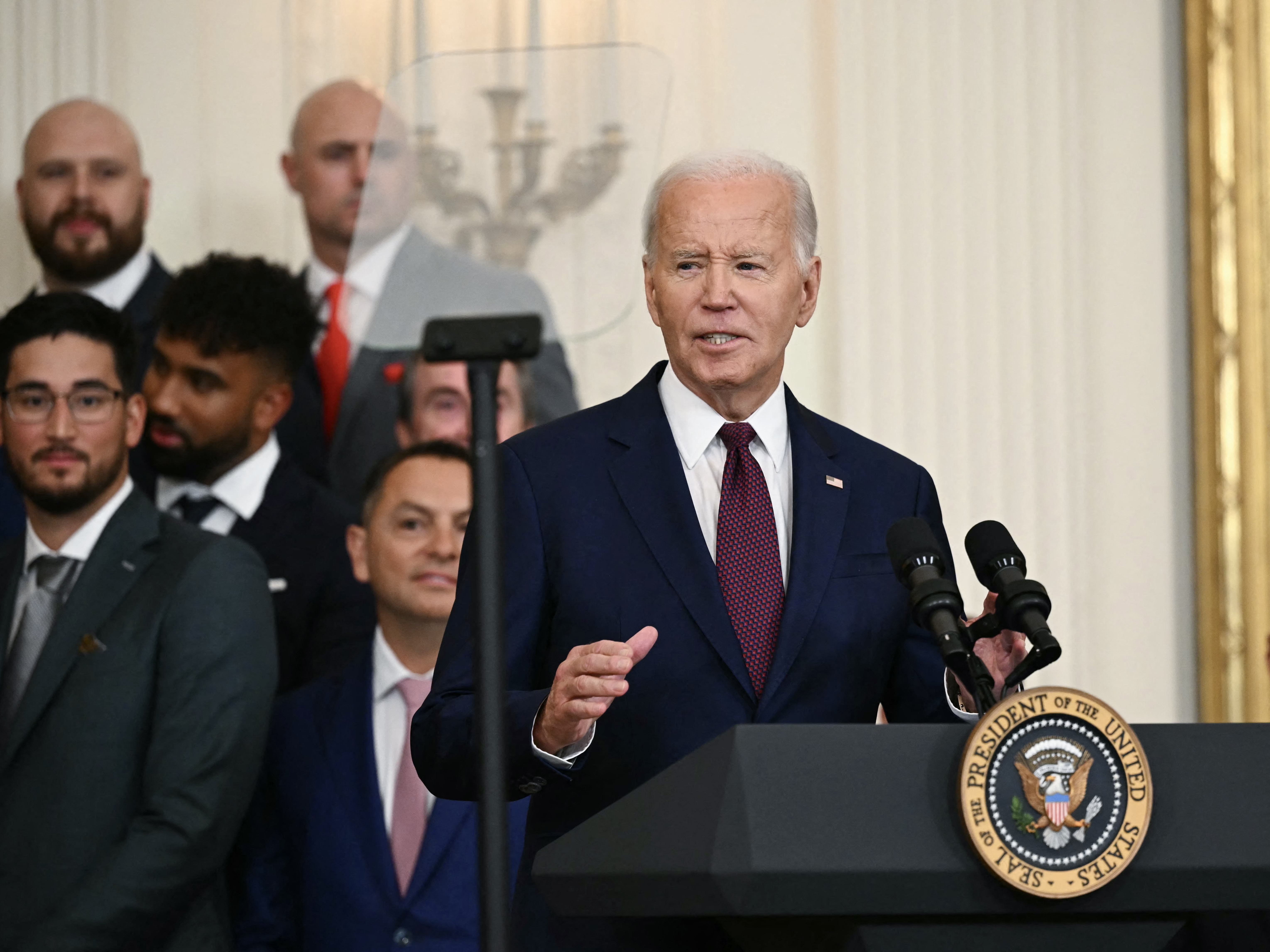 caption: President Joe Biden speaks as he welcomes the Texas Rangers to celebrate their 2023 World Series championship at the White House on August 8, 2024.