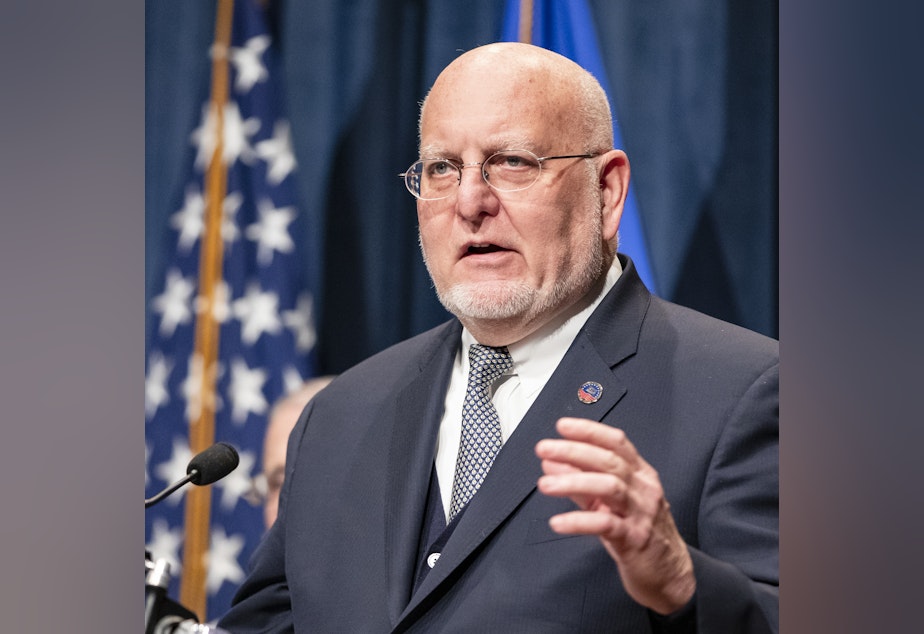 caption: Dr. Robert Redfield, director of the Centers for Disease Control and Prevention, speaks at a news conference Tuesday at the Department of Health and Human Services.