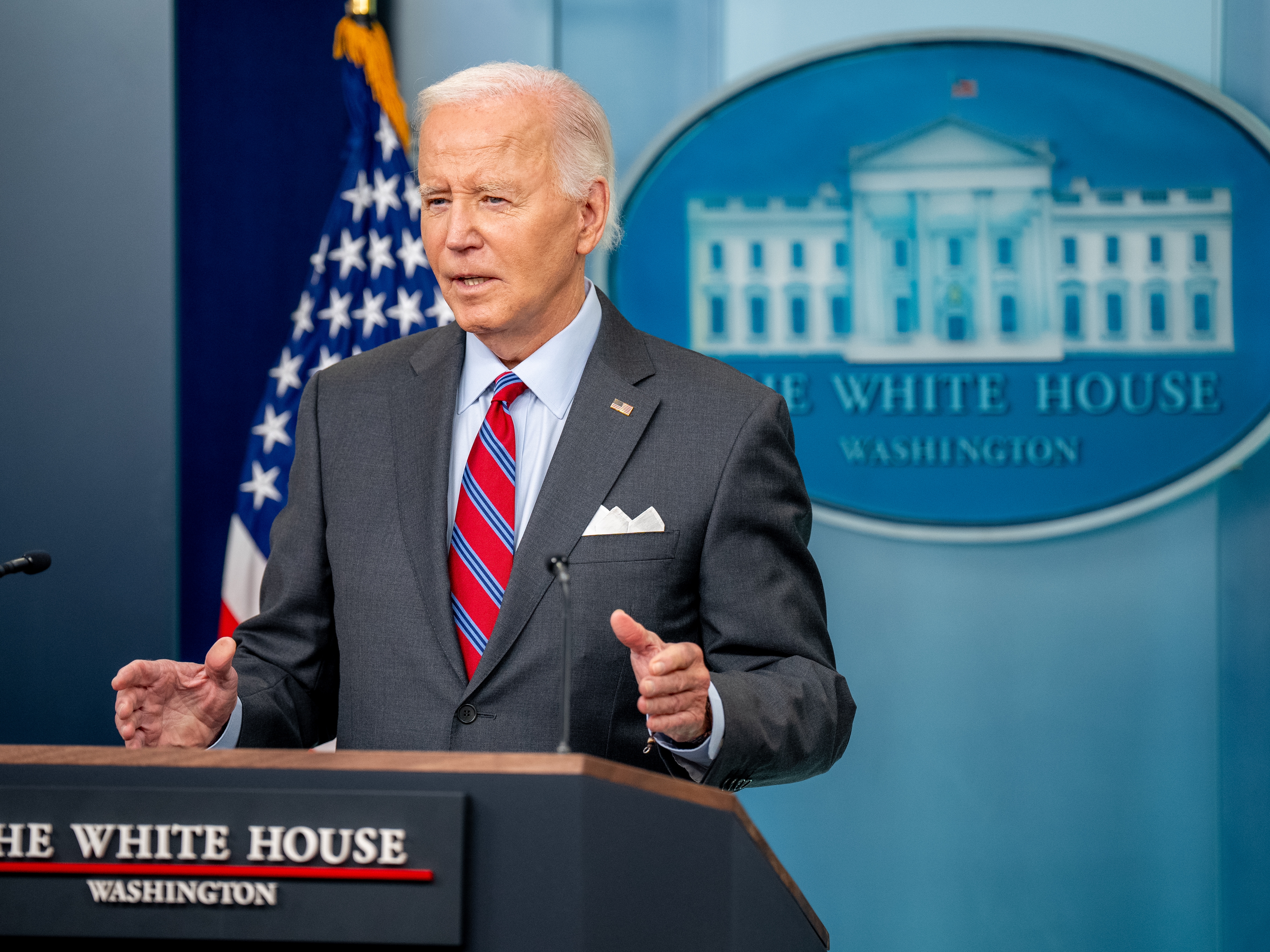 caption: President Biden speaks during a news conference in the Brady Press Briefing Room at the White House on Friday. Biden made a surprise appearance, his first in the briefing room since becoming president, to tout a positive job report and take questions from reporters.
