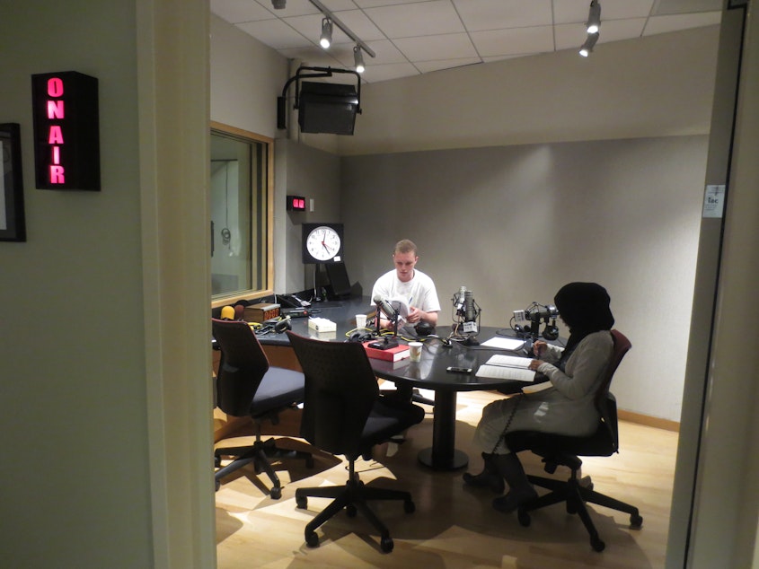 caption: Recording in the KUOW studio on University Way in Seattle.