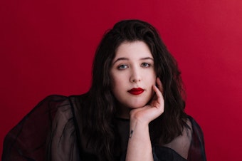 caption: "I feel like music is just a facet of my life, like it doesn't take hierarchical dominance over the people that I love and it never will," Lucy Dacus says. Her third album, <em>Home Video</em>, depicts memories and relationships from her years growing up in Richmond, Va.