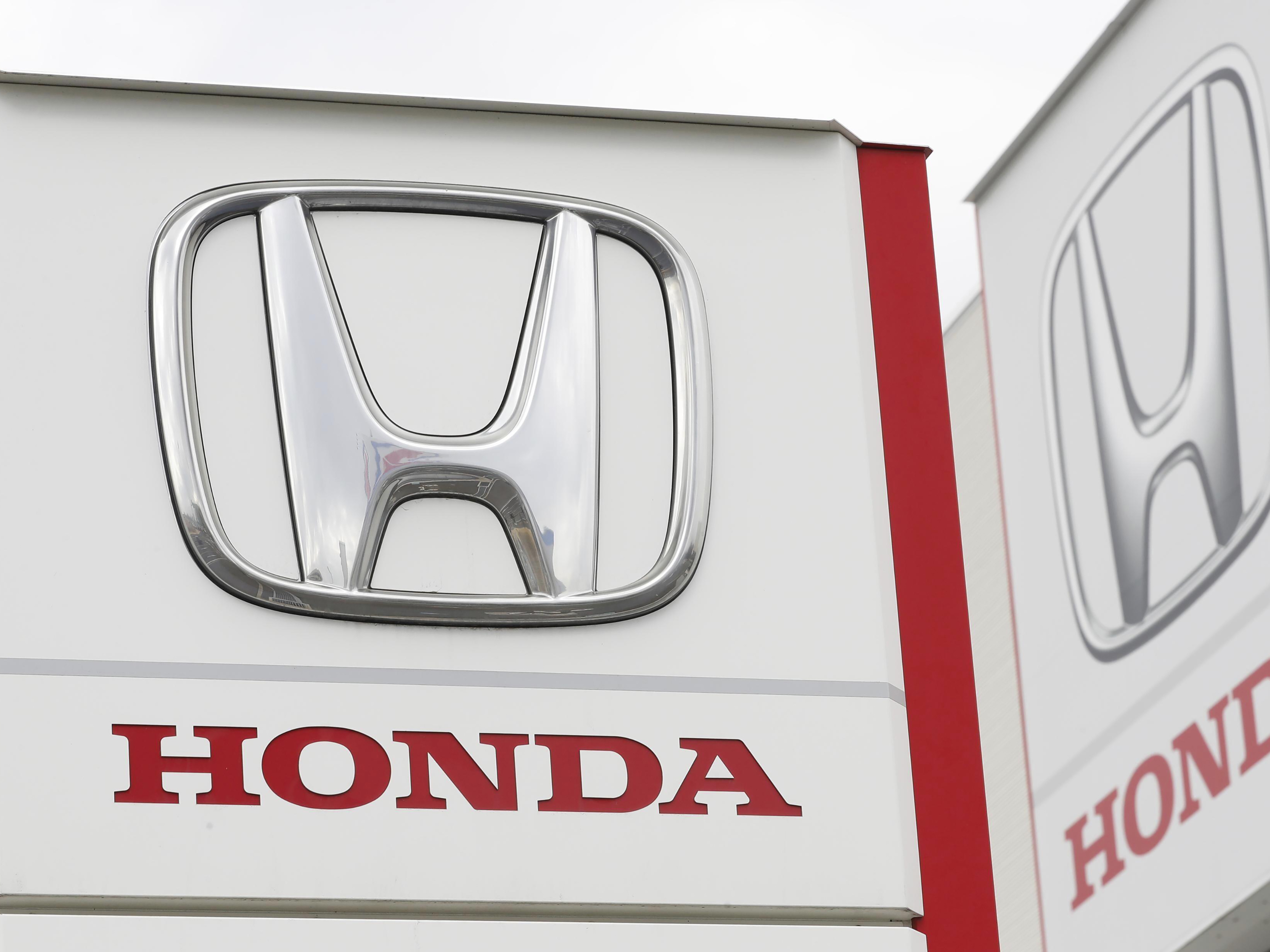 caption: Honda logos are pictured in Tsukuba, Japan, on Feb. 13, 2019. Honda Motor Co. is recalling close to 1.7 million vehicles due to a manufacturing issue that could make it difficult to steer the vehicles and lead to crashes.