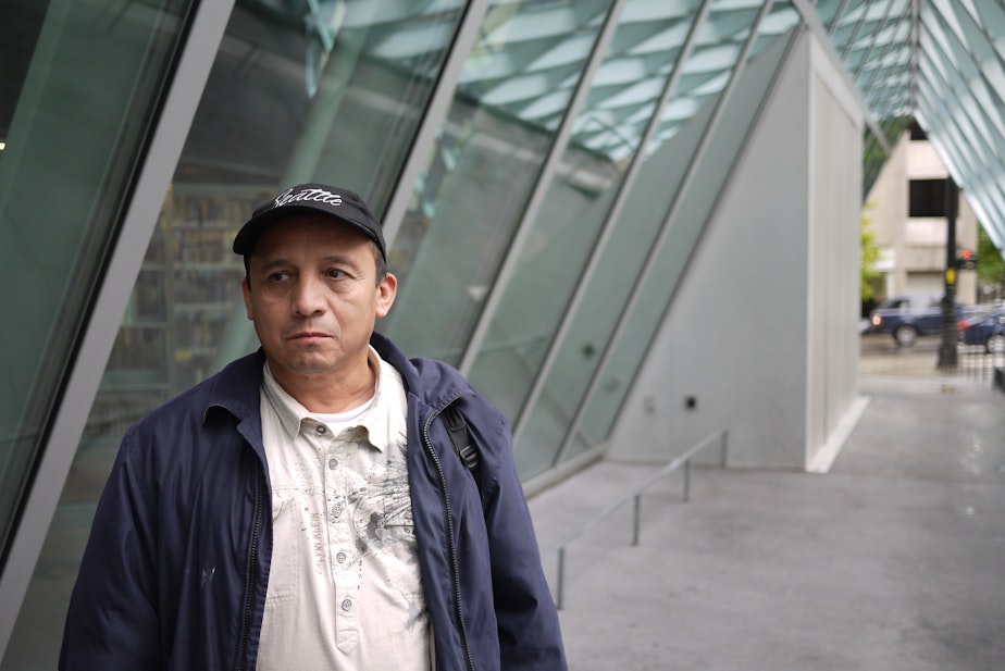 caption: Uriel Ruelas, originally from Mexico City, has lived in Seattle for 15 years. He says immigrants should have the same access to city services as everyone else.