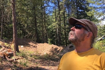 caption: <p>Chris Hopkins built a home in Pine Forest in the 1990s and lived there for more than a decade. He says it&rsquo;s the responsibility of individual property owners to protect their homes from wildfire.</p>