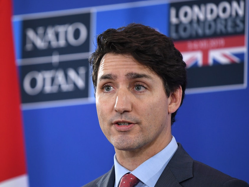 caption: Canadian Prime Minister Justin Trudeau speaks at the NATO summit in Hertford, England, on Dec. 4, 2019. On Friday, he announced a national freeze on the sale, purchase, and transfer of handguns.