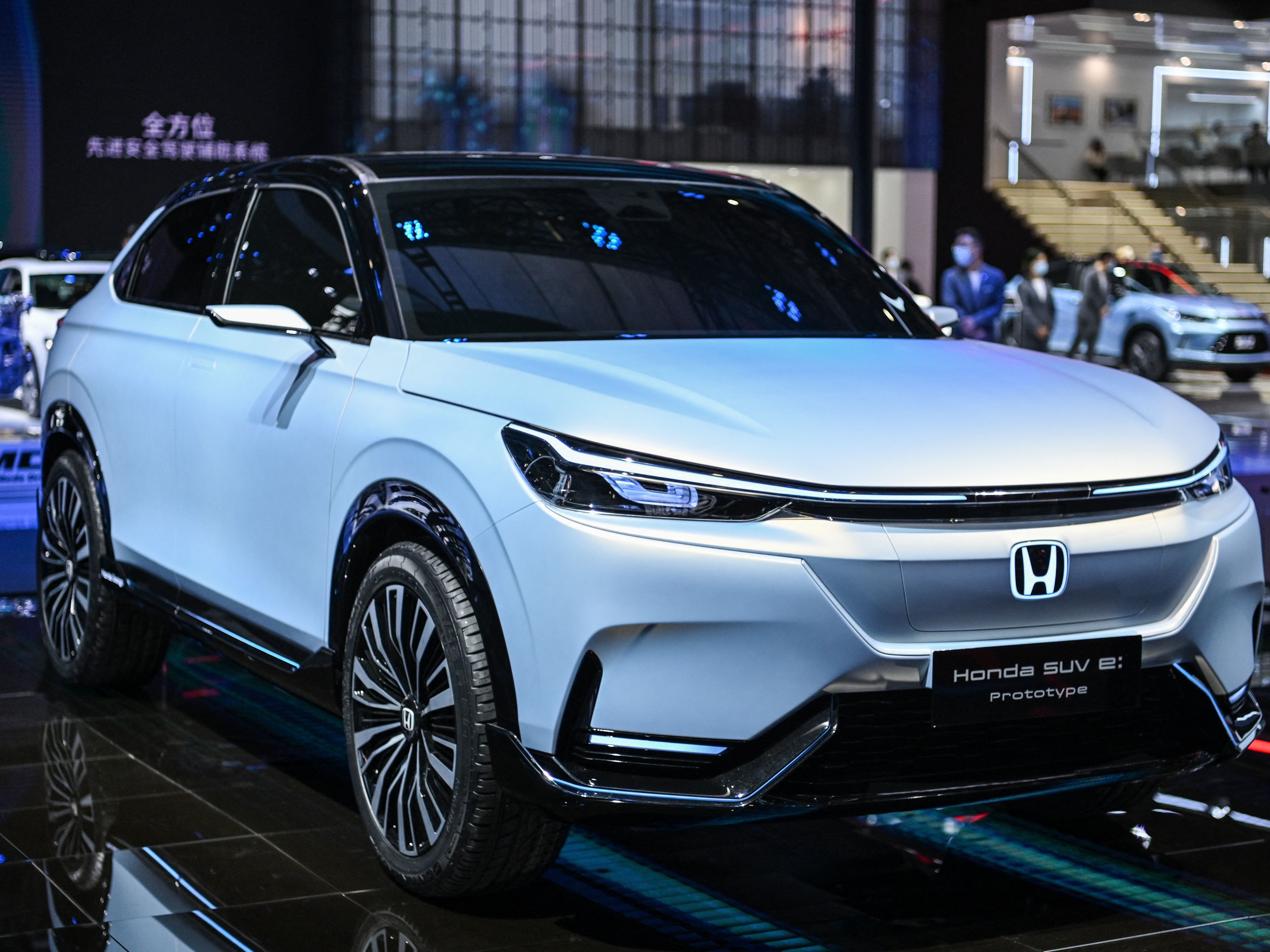 caption: A Honda SUV E prototype is displayed during the 19th Shanghai International Automobile Industry Exhibition in Shanghai on April 20. Honda says battery-powered SUVs will be a key part of its plan to sell exclusively zero-emissions vehicles by 2040.