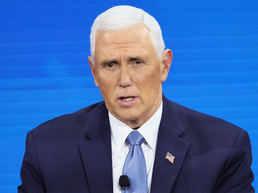 caption: Former Vice President Mike Pence speaks at an event in November. Pence's representatives have said that a "small number" of documents bearing classified markings were found in the former vice president's Indiana home after having been "inadvertently" boxed up. They have been collected by the FBI.