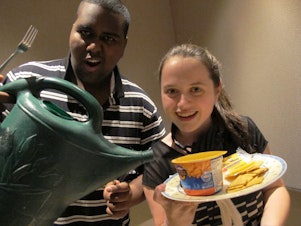 caption: Hosts Yafiet Bezabih and Maddie Ewbank ready with their edible sound effects.