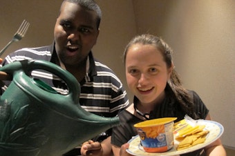 caption: Hosts Yafiet Bezabih and Maddie Ewbank ready with their edible sound effects.